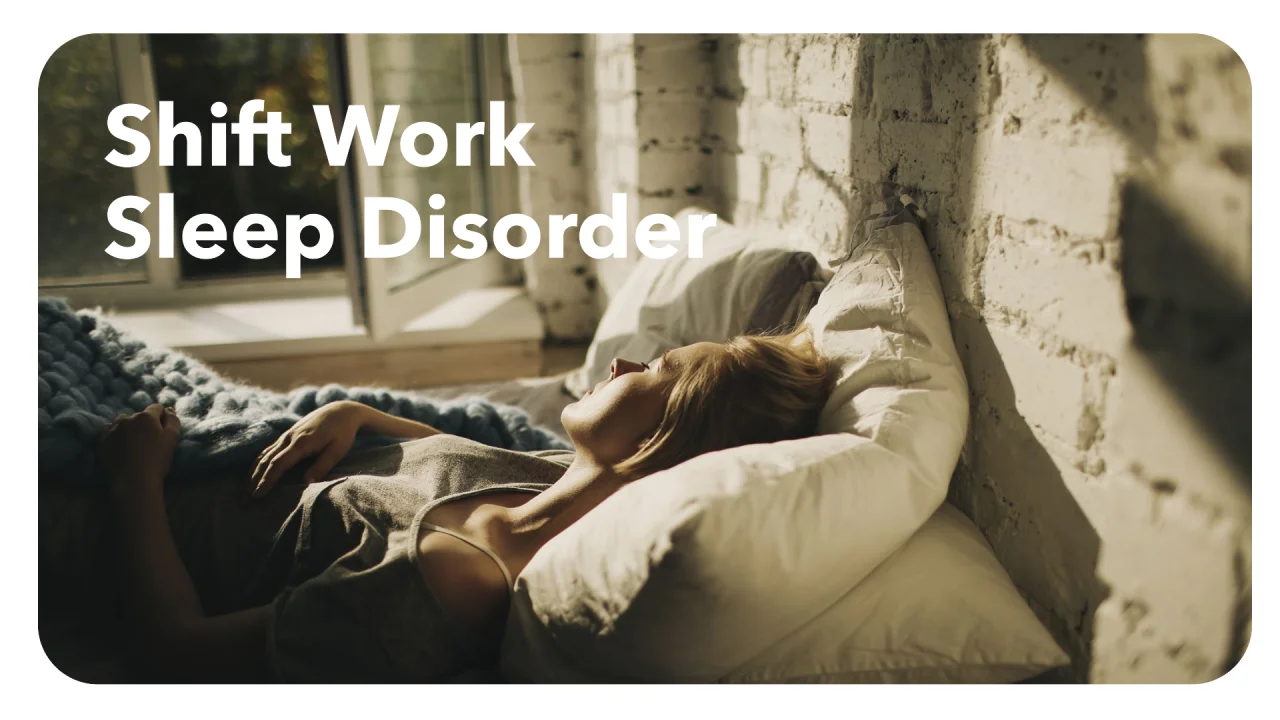 Close up on a plate of mashed potatoes, topped with baked pork chops with cream of mushroom soup, and a side of green beans.