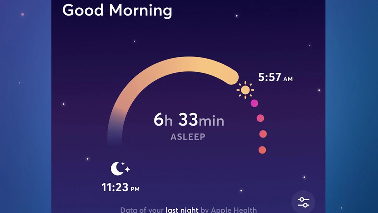 Close up on a plate of mashed potatoes, topped with baked pork chops with cream of mushroom soup, and a side of green beans.